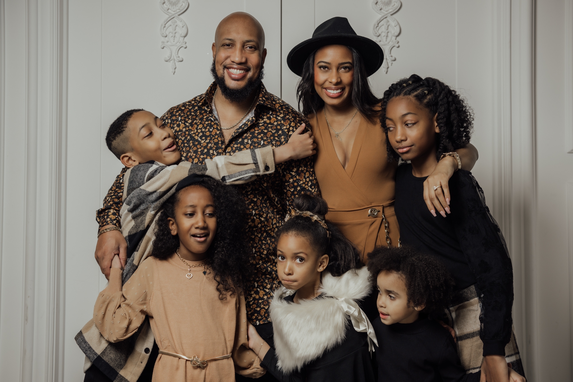 Andrew Alleyne with his wife and children in a family portrait
